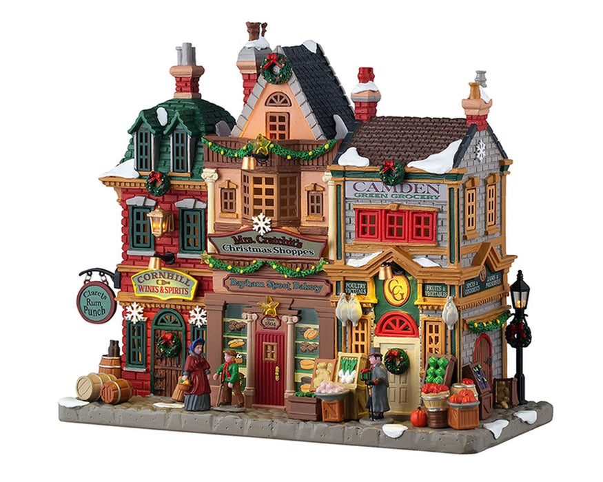 LEMAX Edificio illuminato "Mrs. Cratchit's Christmas Shoppes" H21.5x24.3x11.5 cm
