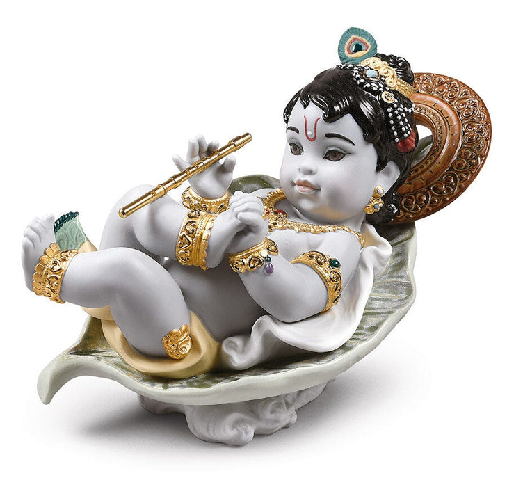 Figurina Krishna on leaf