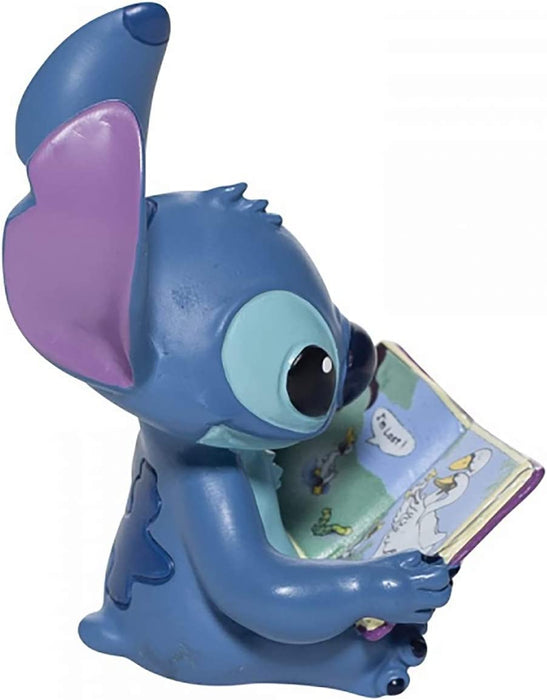 Disney Enesco Showcasev Stitch con Libro