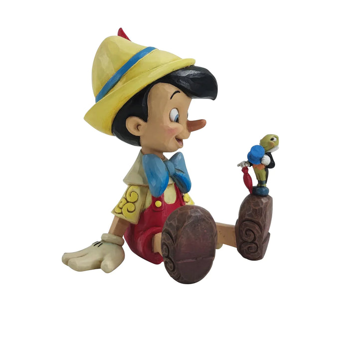 Pinocchio e Jiminy seduti