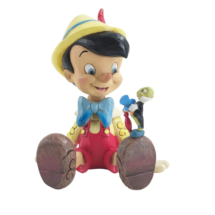 Pinocchio e Jiminy seduti